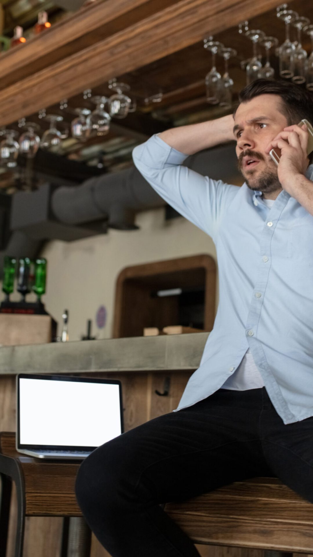 Restaurant, cafe, bar closed due to COVID-19 or Coronavirus outbreak lockdown, stressed owner of small business, depression. Businessman exhausted, upset. Business, economy, finance crisis.